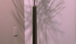 Thistle: welded piano tuning pins on stone base; 74" high overall, top 22" diameter Thistle: welded piano tuning pins on stone base; 74" high overall, top 22" diameter