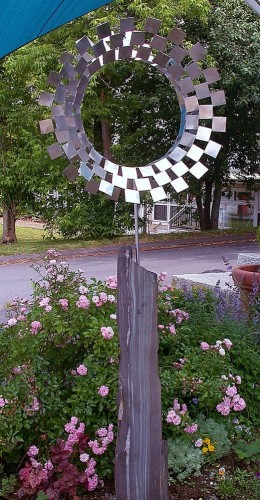 Non-Ferrous Wheel; stainless steel on Norumbega stone; 61" high overall, top 21" diameter