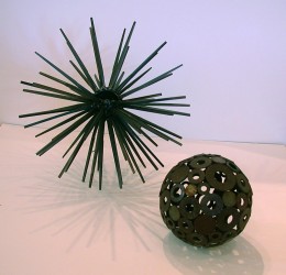 Top left: Sea Urchin; welded spikes, blue marbles; 18" diameter. Bottom right: Round Midnite; welded washers; 8" diameter